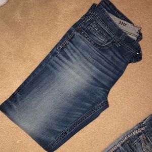 Buckle Black brand blue jeans. 36x36.